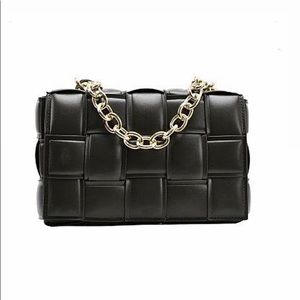 Black leather bag with chain